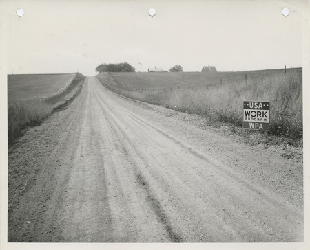 Photograph of gravelling on a farm to market road in Shelby County