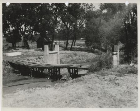 Photograph of a wooden bridge on the college golf course in Ames