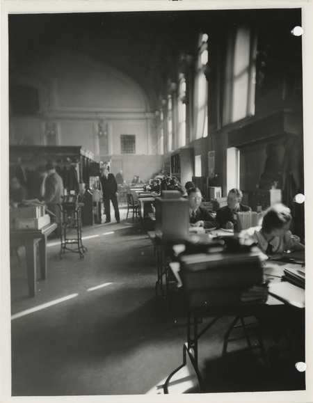 Photograph of people working in the finance department at the city hall in Des Moines