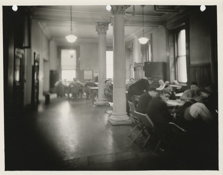 Photograph of people working at the tabulating office for zoning and planning at 109 Old Federal Building in Des Moines