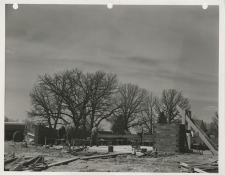 Photograph of the construction of a maintenance shed in Mackey