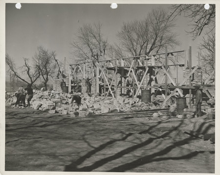 Photograph of people constructing a maintenance garage in Oskaloosa