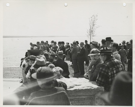 Photograph of group of people gathered during the dedication of lakeshore improvements event