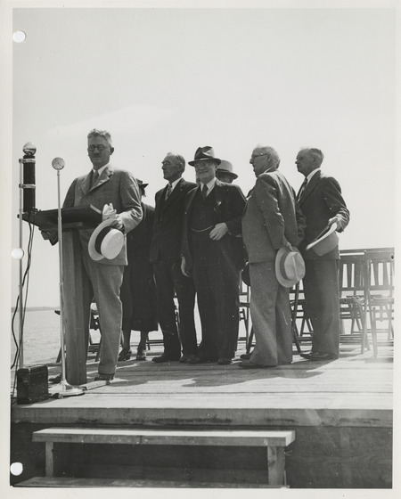 Photograph of group of people gathered during the dedication of lakeshore improvements event