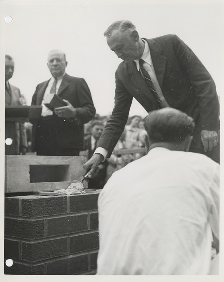 Photograph of group of people gathered during the dedication of bathhouse and shelter house in Riverview Park