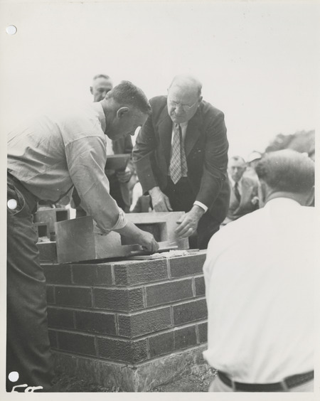 Photograph of group of people gathered during the dedication of bathhouse and shelter house in Riverview Park