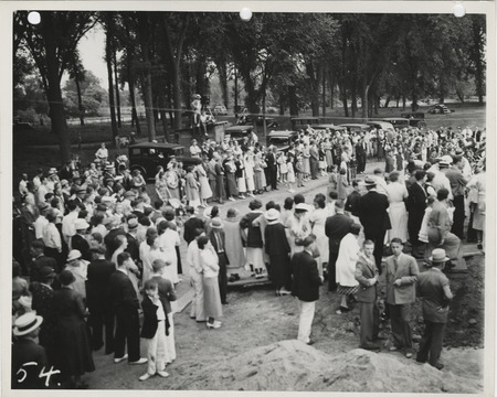 Photograph of group of people gathered during the dedication of bathhouse and shelter house in Riverview Park