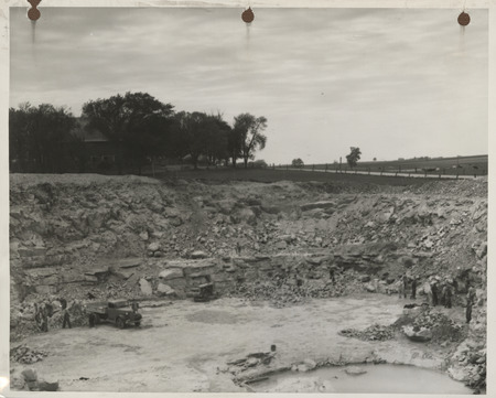 Photograph of men working at the quarry in Finchford