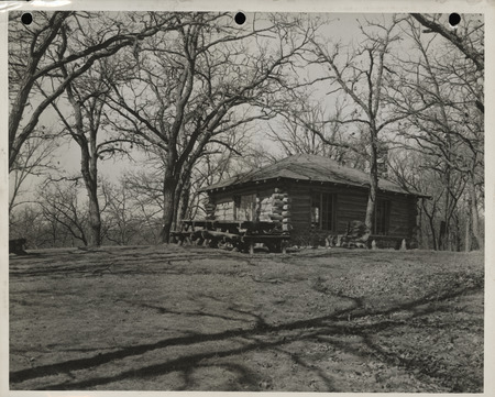 Photograph of a log cabin near the north entrance to Dolliver State Park in Webster County