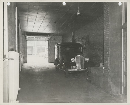 Photograph of the interior of the police garage at city hall in Muscatine