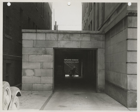Photograph of the exterior of the police garage at city hall in Muscatine