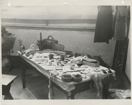 Photograph of a leather goods exhibit at the East Side Community Center in Des Moines