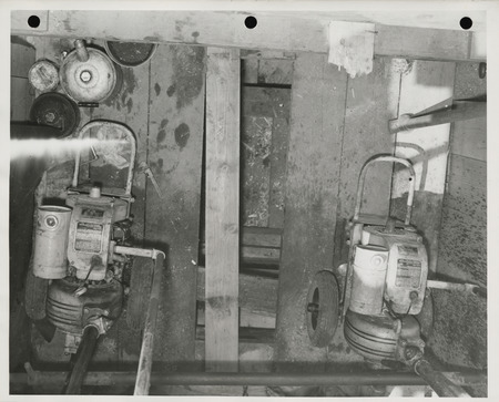 Photograph of water pumps used during construction of an outfall sewer in Webster City