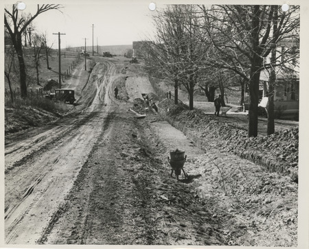 Photograph of people laying water mains in Red Oak