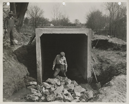 Photograph of people constructing a storm sewer in Muscatine
