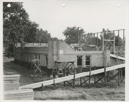 Photograph of school building construction in Arion