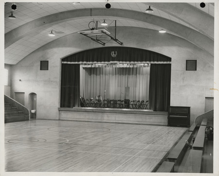 Photograph of the stage in a school gymnasium in Luverne