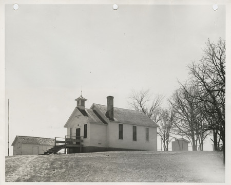 Photograph of a school to be rebuilt in Pottawattamie County