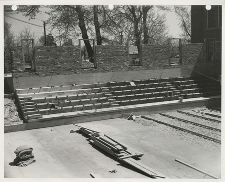 Photograph of school gymnasium bleacher construction in Neola