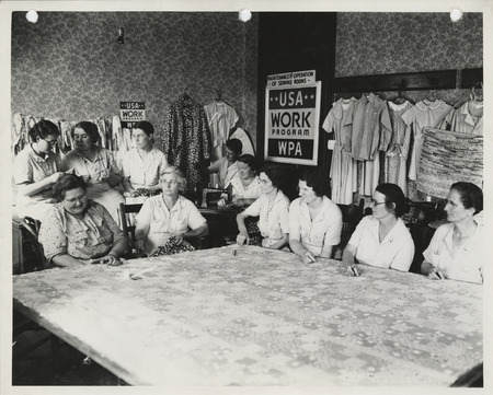Photograph of people in a county sewing room in Corning
