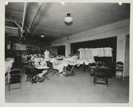 Photograph of people in a county sewing room in Waverly