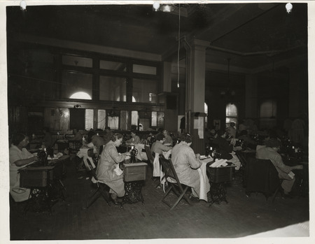 Photograph of people in a county sewing room in Dubuque