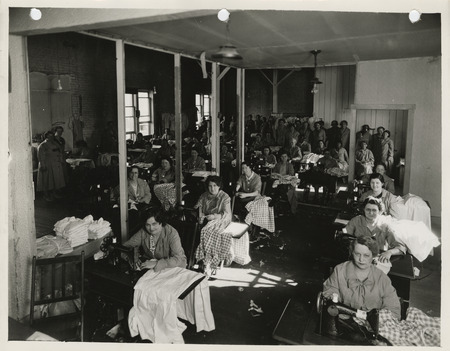 Photograph of women sewing in the sewing room at the South Main Street in Council Bluffs