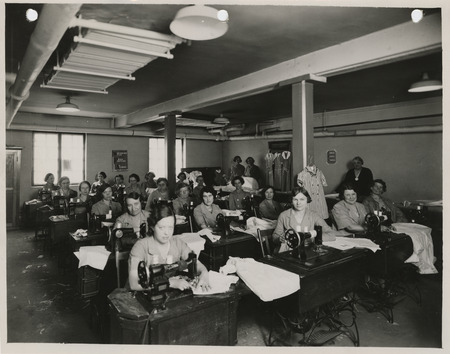 Photograph of women sewing in the sewing room of the Roosevelt School in Council Bluffs
