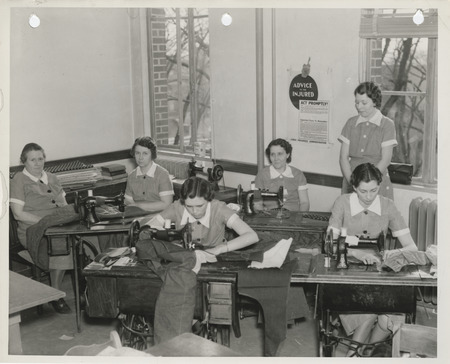 Photograph of women sewing in the sewing room of the Ringgold County Courthouse in Mount Ayr
