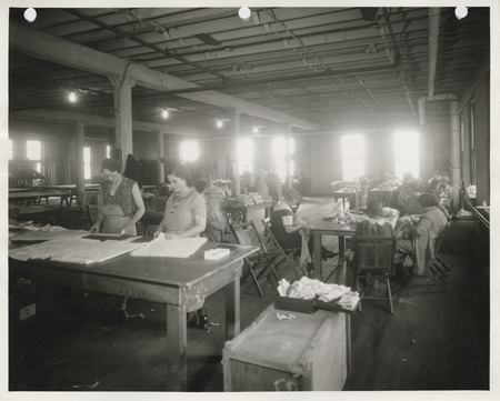 Photograph of women sewing in the Scott County sewing room in Davenport