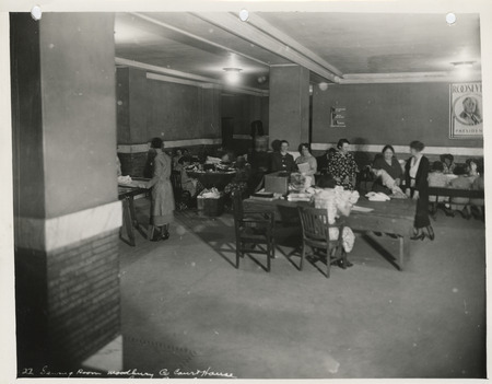 Photograph of women sewing in the sewing room of the Woodbury County Courthouse in Sioux City
