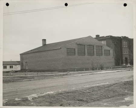 Photograph of the exterior view of the school gymnasium in Rossie