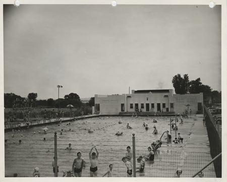 Photograph of people using the municipal swimming pool in Dubuque