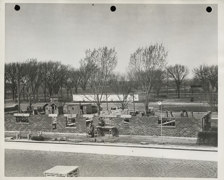 Photograph of the municipal bathhouse under construction at the city park in Red Oak
