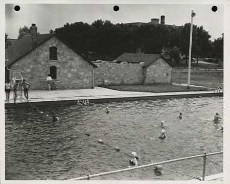 Photograph of people using the municipal swimming pool in Pocahontas