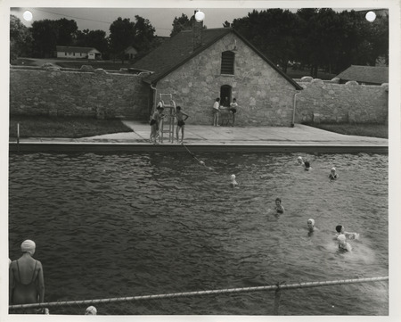 Photograph of people using the municipal swimming pool in Pocahontas