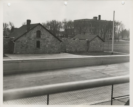 Photograph of the exterior view of the swimming pool and bathhouse in Pocahontas