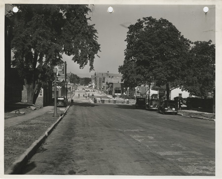 Photograph of people paving the street in Fort Dodge